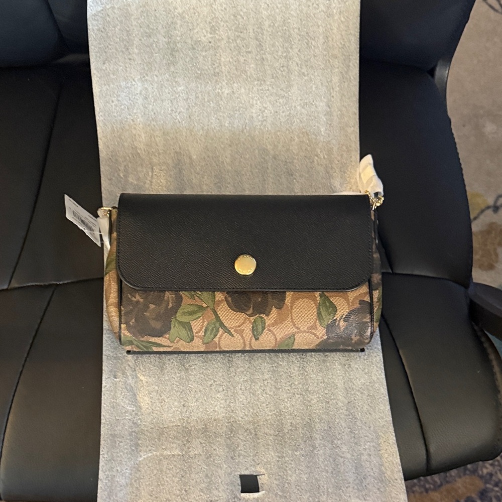Coach Black and Tan Floral Clutch
